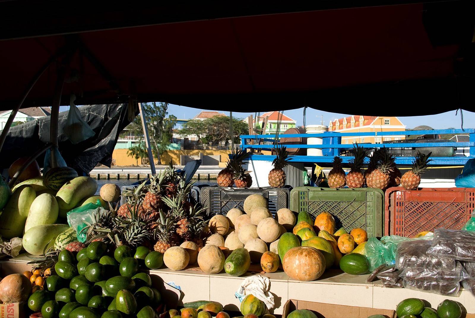 Tropical fruit stacked for sale on the Venezuelan boats of the Floating Market in Willemstad